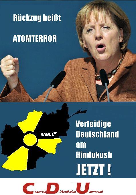 Merkel droht prop.JPG